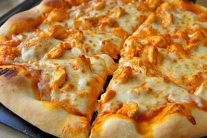 Who created buffalo chicken pizza