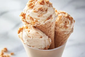Where can I buy not fried chicken ice cream at Walmart? 2 A close-up of not fried chicken ice cream, featuring a vanilla ice cream core with a white chocolate and cornflake coating shaped like a drumstick.