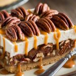 Pecan Pie Cheesecake Delight with caramelized pecan topping and creamy cheesecake layer