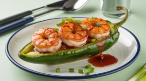 Fiery Cajun Shrimp Jalapeños stuffed with shrimp, cream cheese, and Cajun seasoning, baked to perfection. A spicy, flavorful appetizer.

