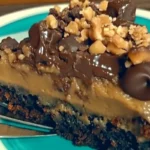 German Chocolate Poke Cake 7 iymarecipes German Chocolate Poke Cake with coconut-pecan frosting and chocolate ganache on top