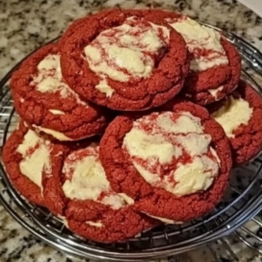 Delicious Red Velvet Cream Cheese Cake topped with smooth cream cheese frosting. Perfect dessert for celebrations and special occasions.