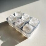 Close-up of frozen tuna cat treat cubes in a tray, the primary keyword is Frozen Tuna Cat Treat Cubes.